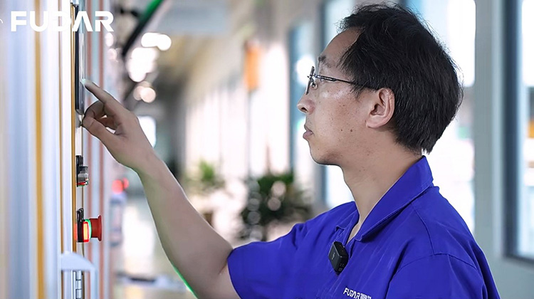 Wan Dai on the production floor